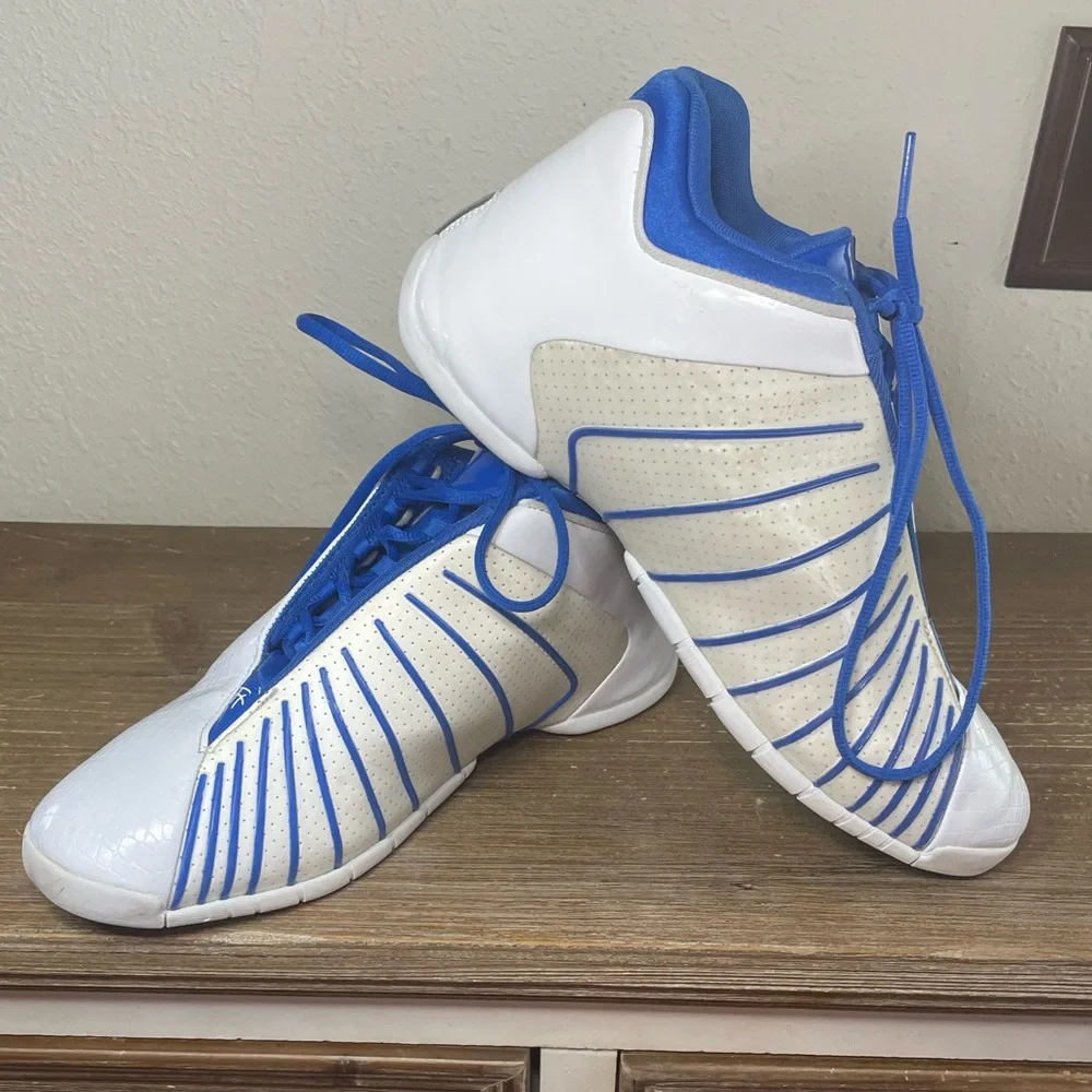 adidas gazelle silver green womens adidas Men's Anthony Edwards 2 Basketball Shoes, Blue Fusion/Zero Metallic/Lime Burst / 10.5 main image 0